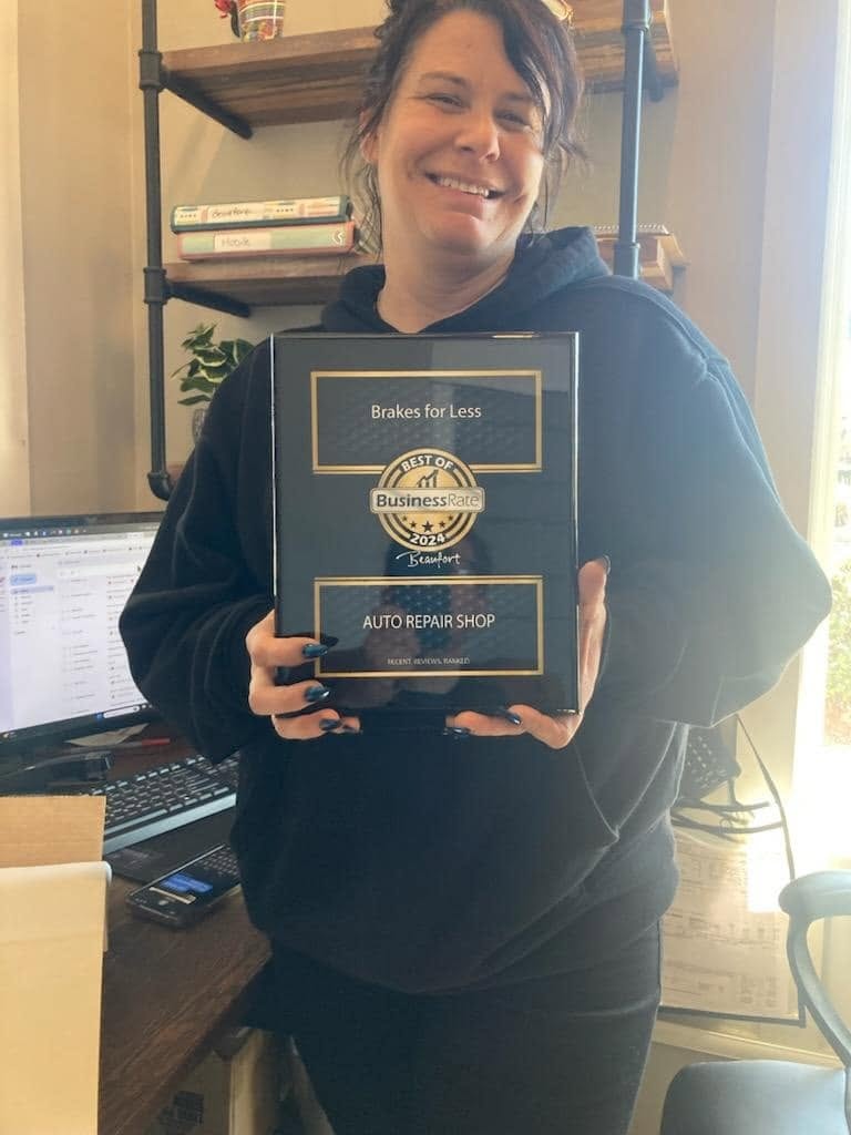 Elizabeth Lawson holding Best of Beaufort 2024 award — BFL Stop & Go Car Care