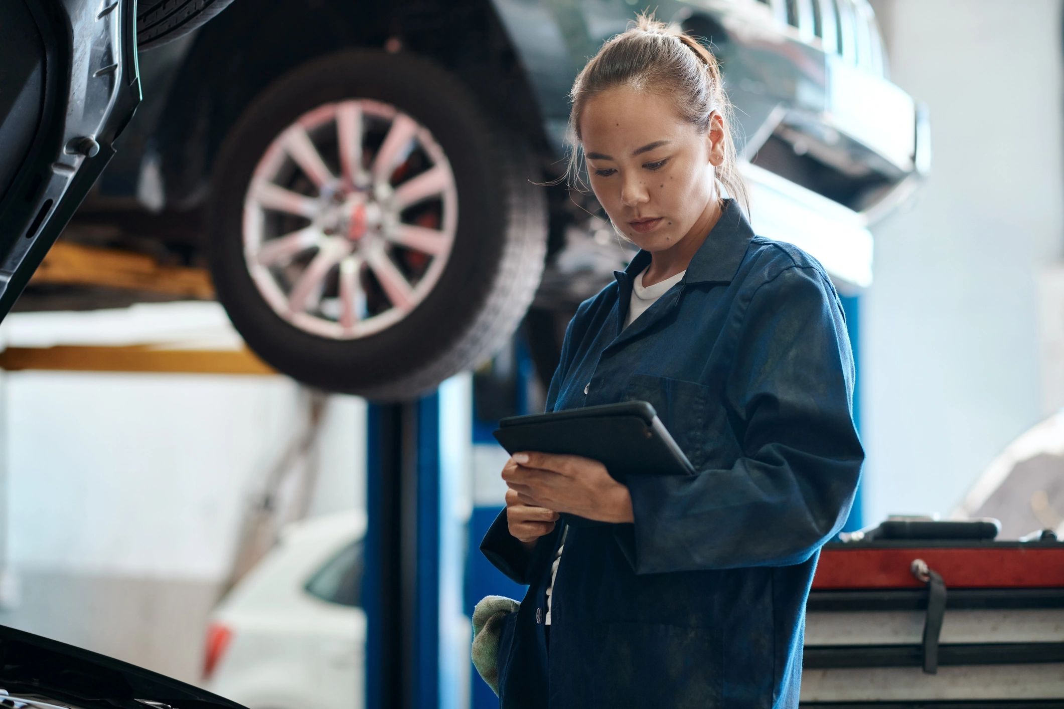 Technician performing a quick system check with a tablet