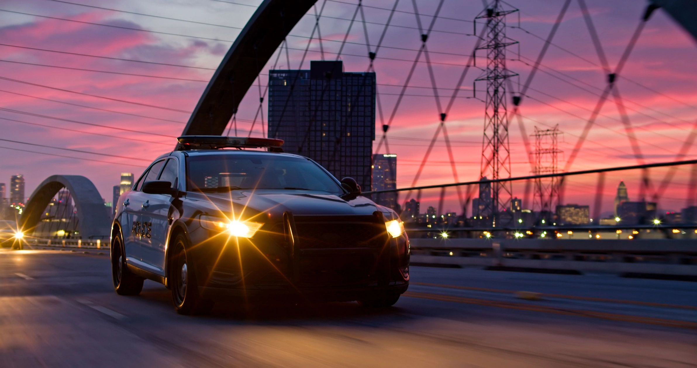 Car on a lift inside a modern service bay